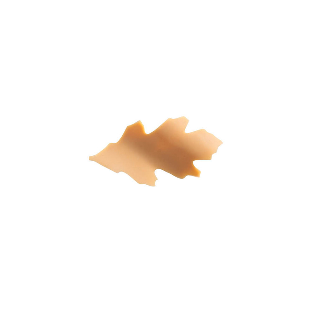 Feuilles de houx courbées en chocolat blanc caramélisé